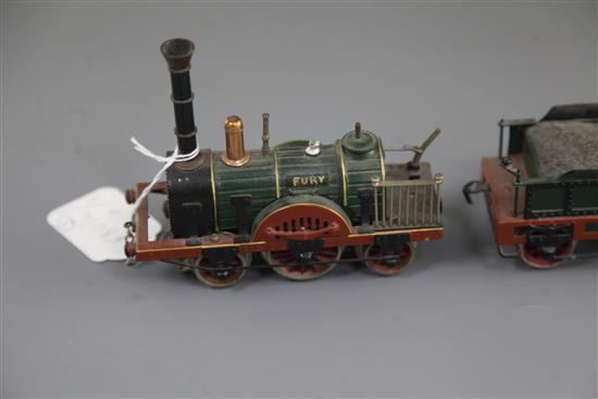 A Marklin electric locomotive and tender, The Fury, loco 5.5in. tender 3.75in. carriages 5.5in.